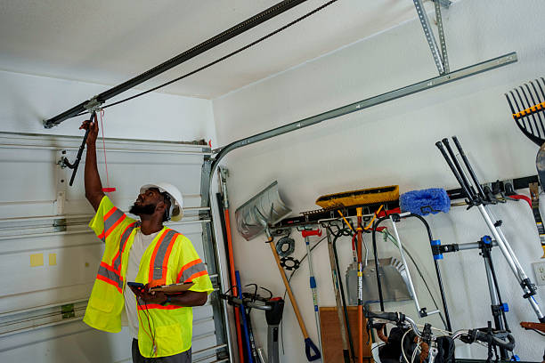 Professional Garage Door Panel Replacement technician working in Highland, IL